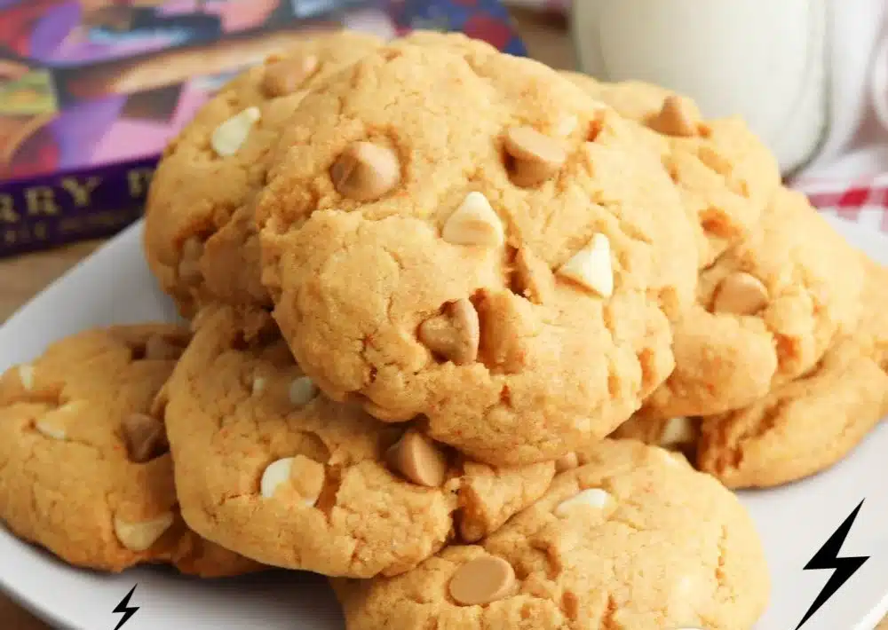 Delicious Butterbeer Cookies served on a plate with a frothy topping.