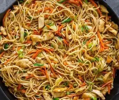 Delicious Chicken Chow Mein with homemade sauce served in a traditional dish.