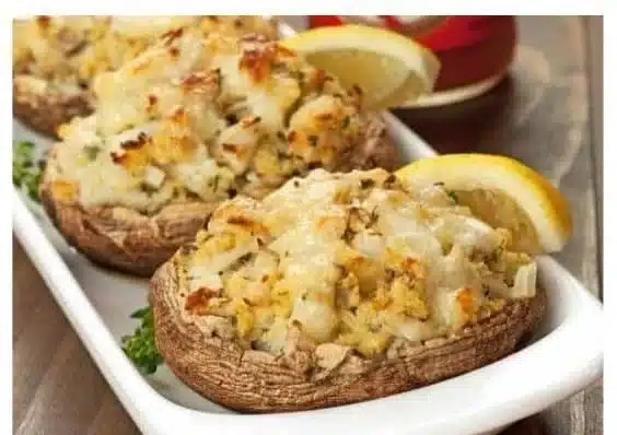 Crab stuffed portobello mushrooms topped with herbs and spices