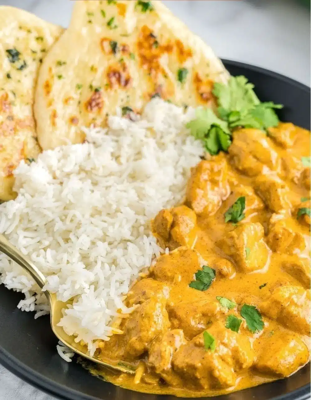 Easy 30-minute stovetop butter chicken recipe on a serving plate.