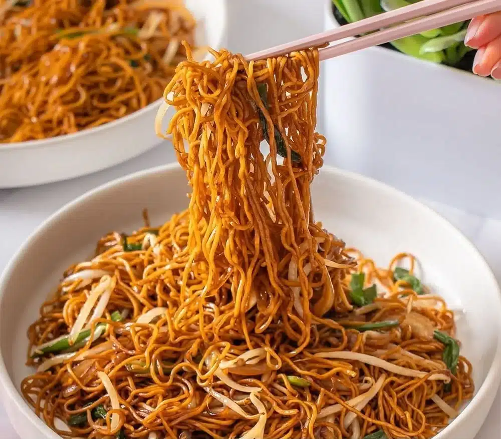 Delicious homemade chow mein noodles with vegetables and chicken.