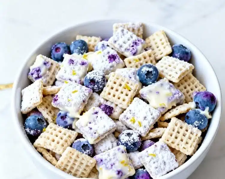 Easy no-bake blueberry lemon cheesecake puppy chow dessert recipe