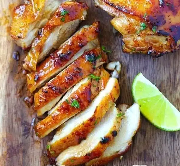 Delicious Honey Lime Chicken served on a plate with garnished vegetables
