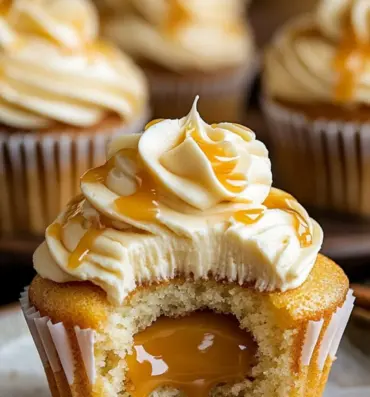 Delicious Butterbeer Cupcakes topped with creamy frosting and magical sprinkles