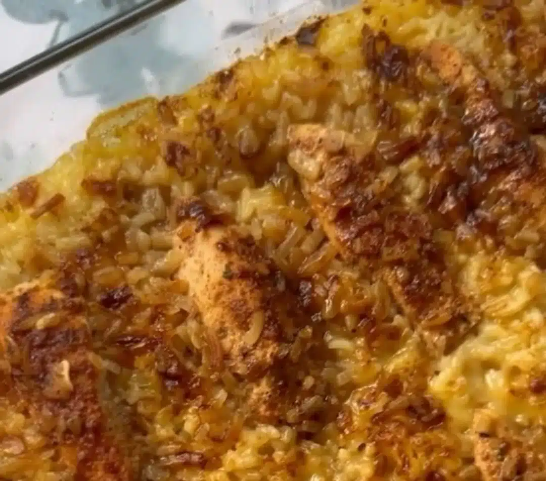 Plate of quick and easy chicken and rice garnished with herbs