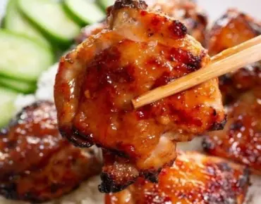 Sticky sweet chili chicken thighs cooked in an air fryer
